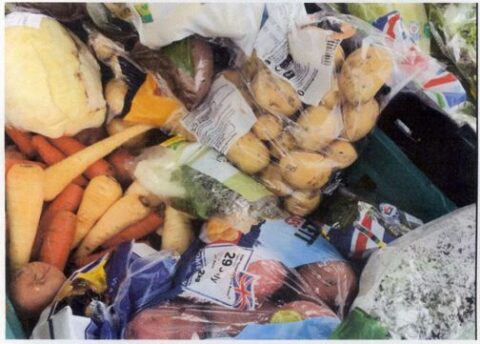 image of loose and bagged potatoes, carrots, parsnips, cabbage and other vegetables